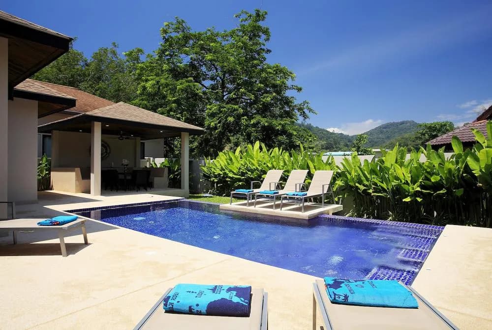 Large private swimming pool, with feature sundeck