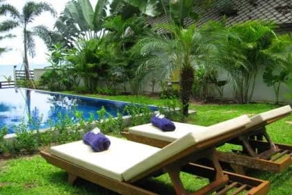 Garden wraps around both Villas and the  Pool