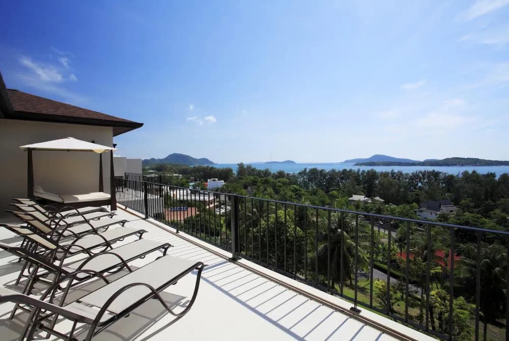 Upper balcony, complete with ample sun beds, boasting impressive sea views