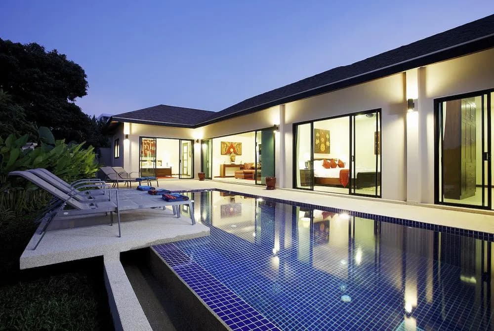 Private pool villa with large living and dining room and all three bedrooms having sliding doors and direct access to the swimming pool access