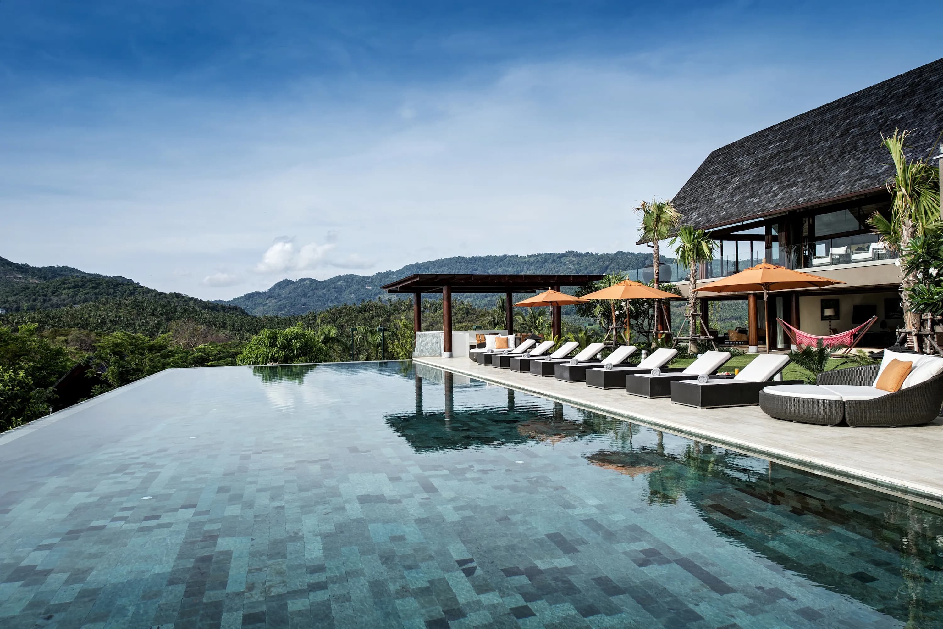 Deck chairs and pool