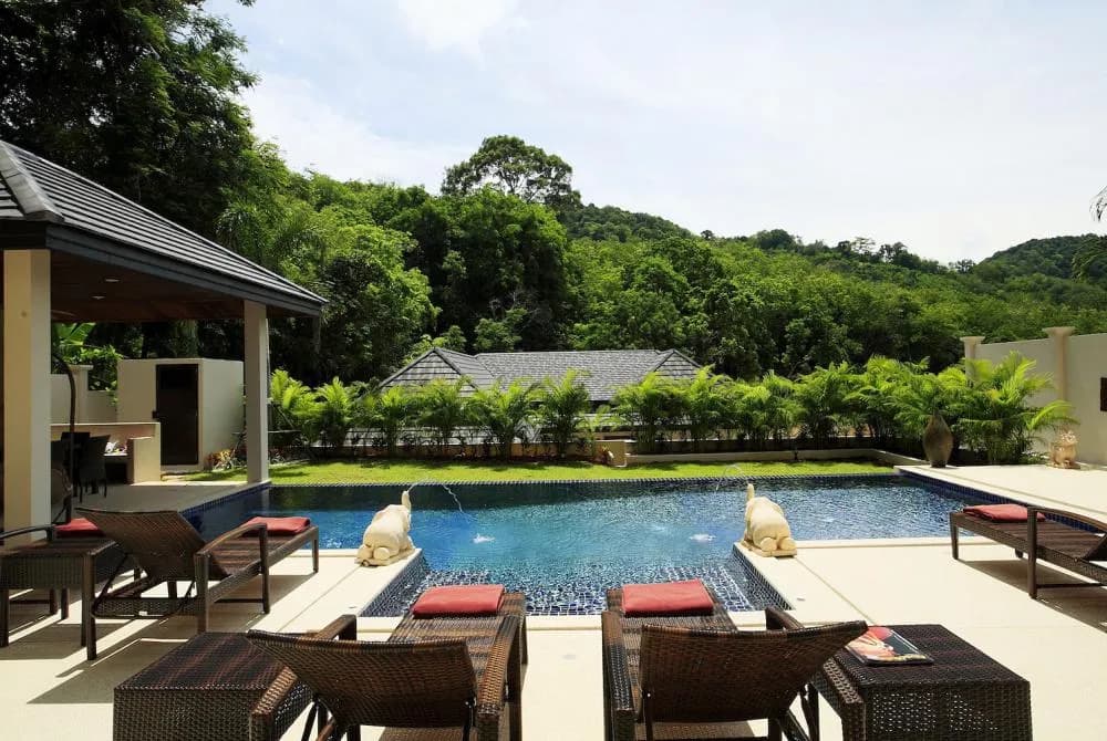The sundeck offers a tranquil setting with views of the hillside